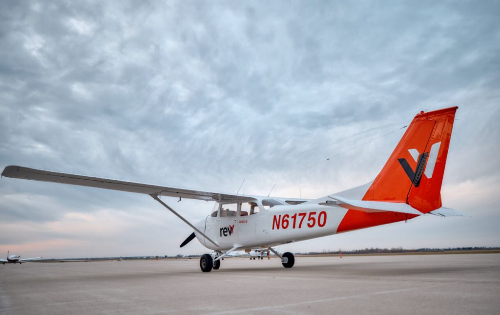 Looking at the back tail of a Cessna 172 Skyhawk with revv Aviation mark